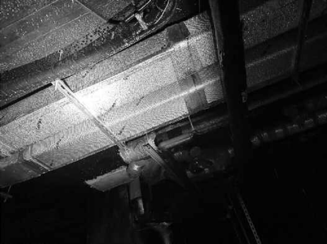 Documentary photograph of condensation on exposed ductwork